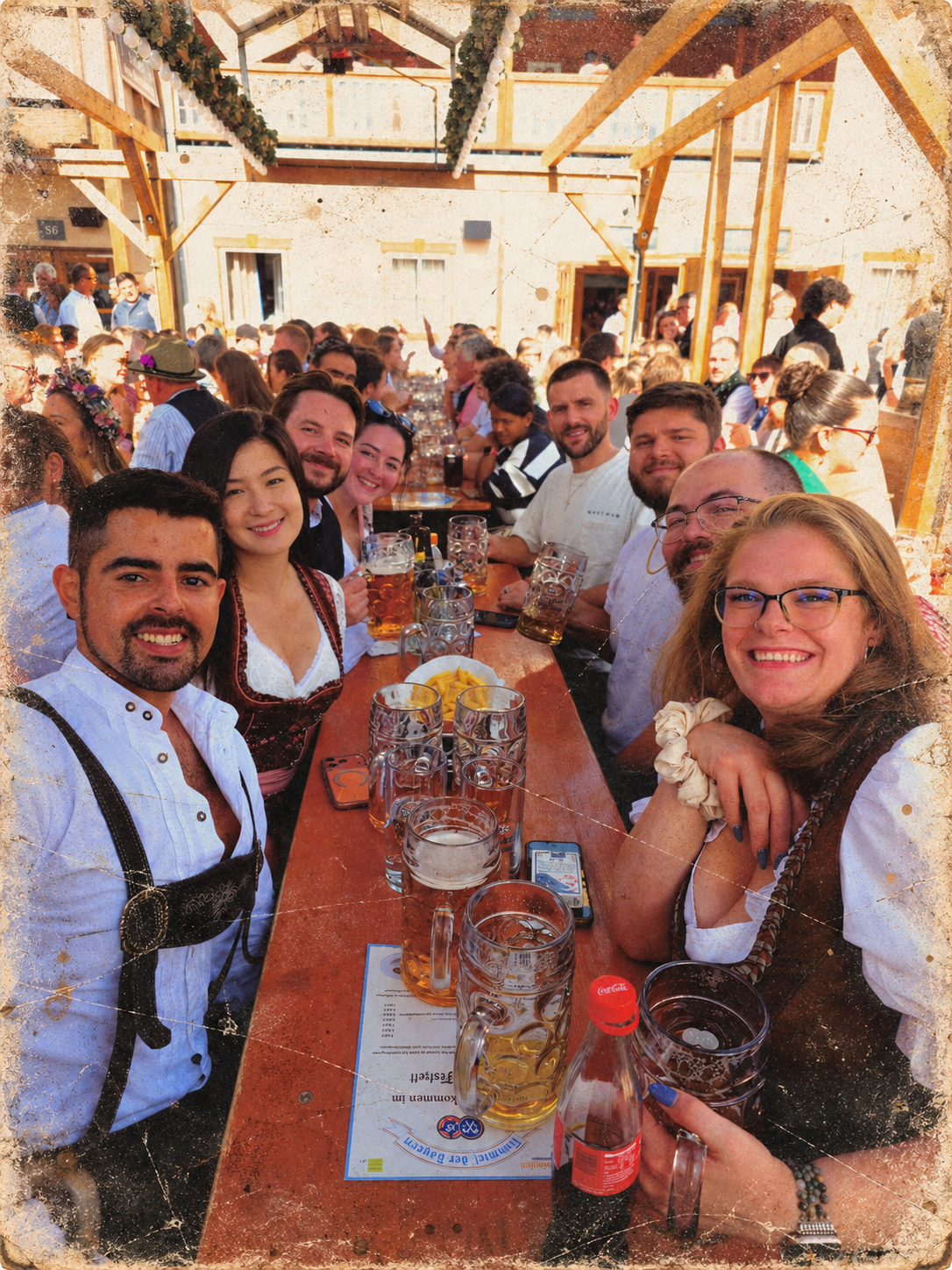 Town Takeover travelers gathered around a table at Oktoberfest